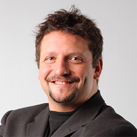 Teilnehmerin im Kurs bei einem Feedback-Gespräch